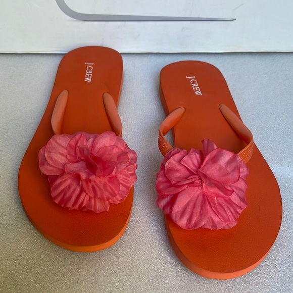 J Crew Women’s orange flower flip flops Size: 7